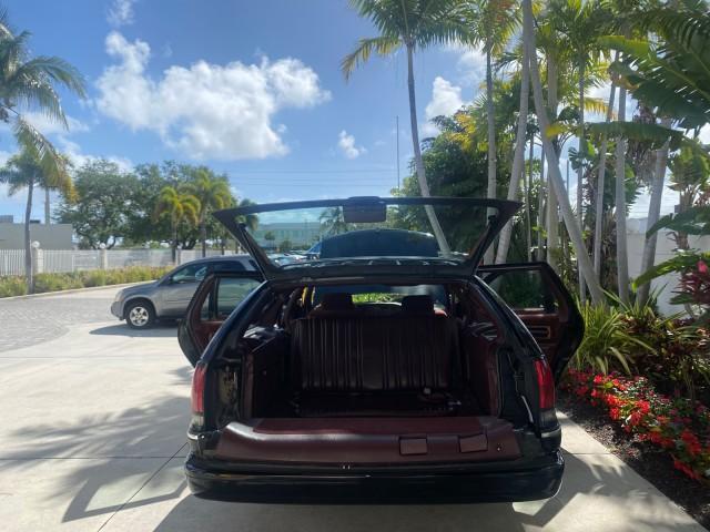 1993 Black /Red Chevrolet Caprice Classic STATON WAGON 1 OWNER (1G1BL8375PW) with an 5.7L V8 F OHV 16V engine, Automatic transmission, located at 4701 North Dixie Hwy, Pompano Beach, FL, 33064, (954) 422-2889, 26.240938, -80.123474 - OUR WEBPAGE FLORIDACARS1.COM HAS OVER 100 PHOTOS AND FREE CARFAX LINK 1993 Chevrolet Caprice -1 OWNER STATION WAGON REAR JUMP SEAT INCLUDED - NO ACCIDENTS EVER - VERY HARD COLOR COMBO TO FIND BLACK EXTERIOR RED INTERIOR Wagon 4 DR 5.7L V8 F OHV 16V Gasoline Rear Wheel Drive Features ABS Brakes Air C - Photo#15