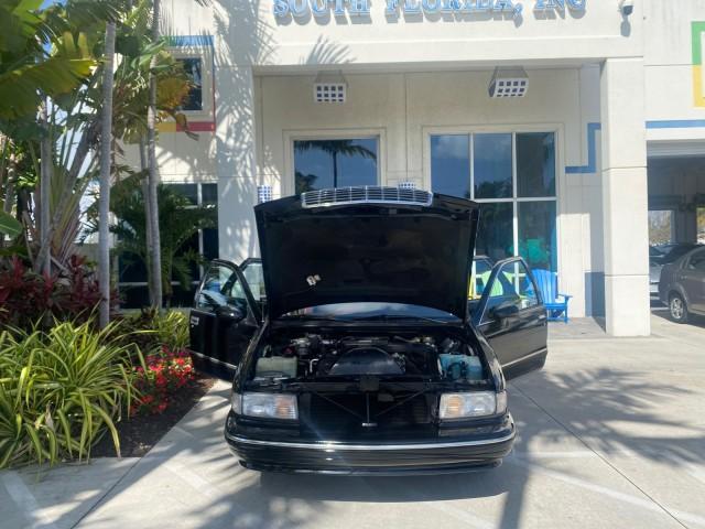 1993 Black /Red Chevrolet Caprice Classic STATON WAGON 1 OWNER (1G1BL8375PW) with an 5.7L V8 F OHV 16V engine, Automatic transmission, located at 4701 North Dixie Hwy, Pompano Beach, FL, 33064, (954) 422-2889, 26.240938, -80.123474 - OUR WEBPAGE FLORIDACARS1.COM HAS OVER 100 PHOTOS AND FREE CARFAX LINK 1993 Chevrolet Caprice -1 OWNER STATION WAGON REAR JUMP SEAT INCLUDED - NO ACCIDENTS EVER - VERY HARD COLOR COMBO TO FIND BLACK EXTERIOR RED INTERIOR Wagon 4 DR 5.7L V8 F OHV 16V Gasoline Rear Wheel Drive Features ABS Brakes Air C - Photo#16