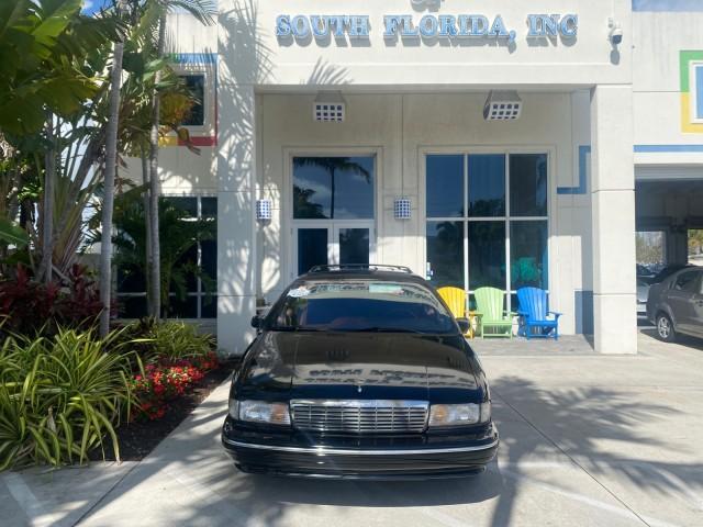 1993 Black /Red Chevrolet Caprice Classic STATON WAGON 1 OWNER (1G1BL8375PW) with an 5.7L V8 F OHV 16V engine, Automatic transmission, located at 4701 North Dixie Hwy, Pompano Beach, FL, 33064, (954) 422-2889, 26.240938, -80.123474 - OUR WEBPAGE FLORIDACARS1.COM HAS OVER 100 PHOTOS AND FREE CARFAX LINK 1993 Chevrolet Caprice -1 OWNER STATION WAGON REAR JUMP SEAT INCLUDED - NO ACCIDENTS EVER - VERY HARD COLOR COMBO TO FIND BLACK EXTERIOR RED INTERIOR Wagon 4 DR 5.7L V8 F OHV 16V Gasoline Rear Wheel Drive Features ABS Brakes Air C - Photo#26