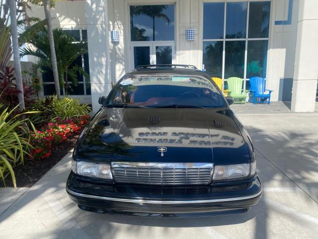 1993 Black /Red Chevrolet Caprice Classic STATON WAGON 1 OWNER (1G1BL8375PW) with an 5.7L V8 F OHV 16V engine, Automatic transmission, located at 4701 North Dixie Hwy, Pompano Beach, FL, 33064, (954) 422-2889, 26.240938, -80.123474 - OUR WEBPAGE FLORIDACARS1.COM HAS OVER 100 PHOTOS AND FREE CARFAX LINK 1993 Chevrolet Caprice -1 OWNER STATION WAGON REAR JUMP SEAT INCLUDED - NO ACCIDENTS EVER - VERY HARD COLOR COMBO TO FIND BLACK EXTERIOR RED INTERIOR Wagon 4 DR 5.7L V8 F OHV 16V Gasoline Rear Wheel Drive Features ABS Brakes Air C - Photo#27