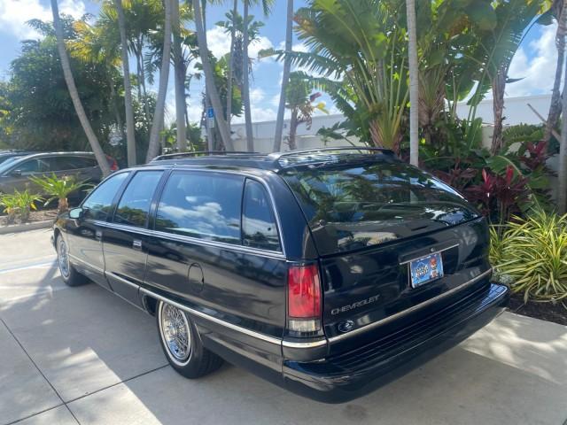 1993 Black /Red Chevrolet Caprice Classic STATON WAGON 1 OWNER (1G1BL8375PW) with an 5.7L V8 F OHV 16V engine, Automatic transmission, located at 4701 North Dixie Hwy, Pompano Beach, FL, 33064, (954) 422-2889, 26.240938, -80.123474 - OUR WEBPAGE FLORIDACARS1.COM HAS OVER 100 PHOTOS AND FREE CARFAX LINK 1993 Chevrolet Caprice -1 OWNER STATION WAGON REAR JUMP SEAT INCLUDED - NO ACCIDENTS EVER - VERY HARD COLOR COMBO TO FIND BLACK EXTERIOR RED INTERIOR Wagon 4 DR 5.7L V8 F OHV 16V Gasoline Rear Wheel Drive Features ABS Brakes Air C - Photo#33