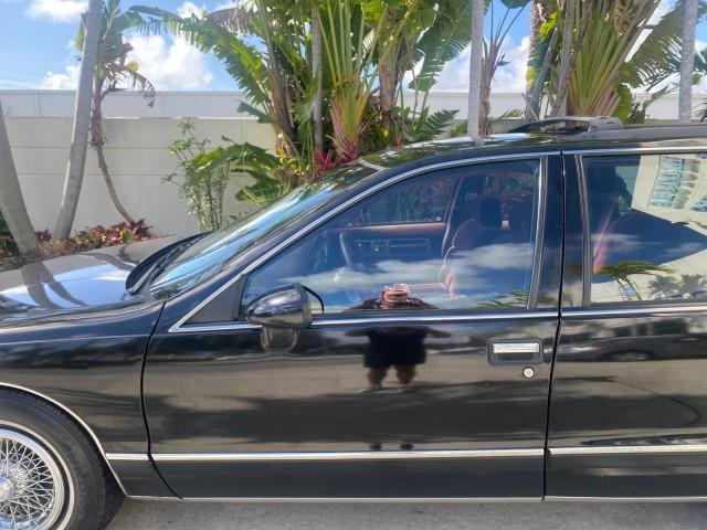 1993 Black /Red Chevrolet Caprice Classic STATON WAGON 1 OWNER (1G1BL8375PW) with an 5.7L V8 F OHV 16V engine, Automatic transmission, located at 4701 North Dixie Hwy, Pompano Beach, FL, 33064, (954) 422-2889, 26.240938, -80.123474 - OUR WEBPAGE FLORIDACARS1.COM HAS OVER 100 PHOTOS AND FREE CARFAX LINK 1993 Chevrolet Caprice -1 OWNER STATION WAGON REAR JUMP SEAT INCLUDED - NO ACCIDENTS EVER - VERY HARD COLOR COMBO TO FIND BLACK EXTERIOR RED INTERIOR Wagon 4 DR 5.7L V8 F OHV 16V Gasoline Rear Wheel Drive Features ABS Brakes Air C - Photo#36