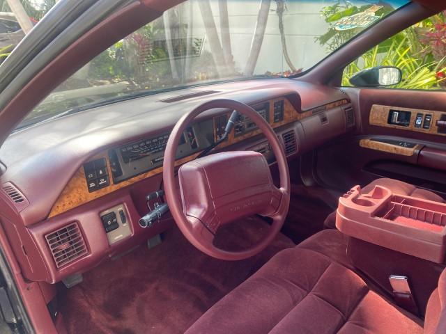 1993 Black /Red Chevrolet Caprice Classic STATON WAGON 1 OWNER (1G1BL8375PW) with an 5.7L V8 F OHV 16V engine, Automatic transmission, located at 4701 North Dixie Hwy, Pompano Beach, FL, 33064, (954) 422-2889, 26.240938, -80.123474 - OUR WEBPAGE FLORIDACARS1.COM HAS OVER 100 PHOTOS AND FREE CARFAX LINK 1993 Chevrolet Caprice -1 OWNER STATION WAGON REAR JUMP SEAT INCLUDED - NO ACCIDENTS EVER - VERY HARD COLOR COMBO TO FIND BLACK EXTERIOR RED INTERIOR Wagon 4 DR 5.7L V8 F OHV 16V Gasoline Rear Wheel Drive Features ABS Brakes Air C - Photo#48