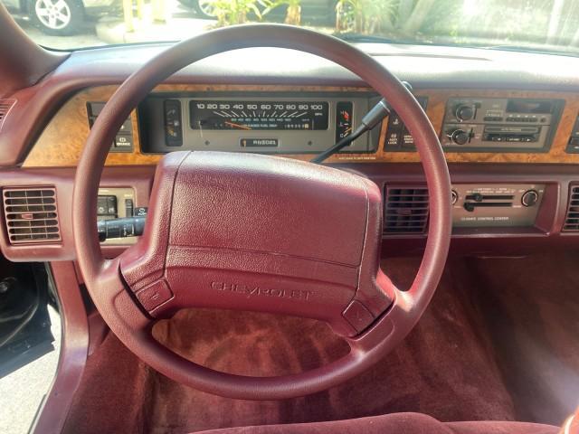 1993 Black /Red Chevrolet Caprice Classic STATON WAGON 1 OWNER (1G1BL8375PW) with an 5.7L V8 F OHV 16V engine, Automatic transmission, located at 4701 North Dixie Hwy, Pompano Beach, FL, 33064, (954) 422-2889, 26.240938, -80.123474 - OUR WEBPAGE FLORIDACARS1.COM HAS OVER 100 PHOTOS AND FREE CARFAX LINK 1993 Chevrolet Caprice -1 OWNER STATION WAGON REAR JUMP SEAT INCLUDED - NO ACCIDENTS EVER - VERY HARD COLOR COMBO TO FIND BLACK EXTERIOR RED INTERIOR Wagon 4 DR 5.7L V8 F OHV 16V Gasoline Rear Wheel Drive Features ABS Brakes Air C - Photo#49