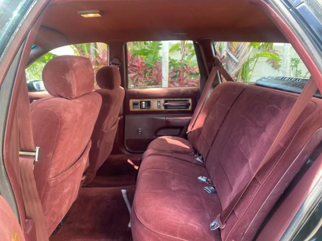 1993 Black /Red Chevrolet Caprice Classic STATON WAGON 1 OWNER (1G1BL8375PW) with an 5.7L V8 F OHV 16V engine, Automatic transmission, located at 4701 North Dixie Hwy, Pompano Beach, FL, 33064, (954) 422-2889, 26.240938, -80.123474 - OUR WEBPAGE FLORIDACARS1.COM HAS OVER 100 PHOTOS AND FREE CARFAX LINK 1993 Chevrolet Caprice -1 OWNER STATION WAGON REAR JUMP SEAT INCLUDED - NO ACCIDENTS EVER - VERY HARD COLOR COMBO TO FIND BLACK EXTERIOR RED INTERIOR Wagon 4 DR 5.7L V8 F OHV 16V Gasoline Rear Wheel Drive Features ABS Brakes Air C - Photo#71