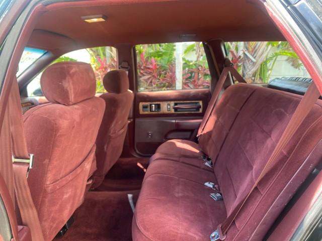 1993 Black /Red Chevrolet Caprice Classic STATON WAGON 1 OWNER (1G1BL8375PW) with an 5.7L V8 F OHV 16V engine, Automatic transmission, located at 4701 North Dixie Hwy, Pompano Beach, FL, 33064, (954) 422-2889, 26.240938, -80.123474 - OUR WEBPAGE FLORIDACARS1.COM HAS OVER 100 PHOTOS AND FREE CARFAX LINK 1993 Chevrolet Caprice -1 OWNER STATION WAGON REAR JUMP SEAT INCLUDED - NO ACCIDENTS EVER - VERY HARD COLOR COMBO TO FIND BLACK EXTERIOR RED INTERIOR Wagon 4 DR 5.7L V8 F OHV 16V Gasoline Rear Wheel Drive Features ABS Brakes Air C - Photo#72