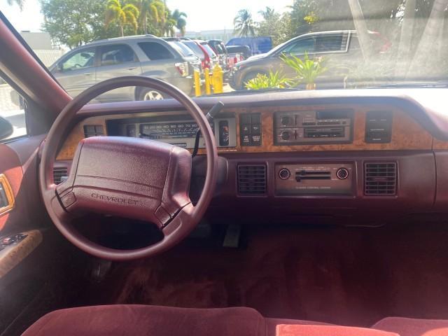 1993 Black /Red Chevrolet Caprice Classic STATON WAGON 1 OWNER (1G1BL8375PW) with an 5.7L V8 F OHV 16V engine, Automatic transmission, located at 4701 North Dixie Hwy, Pompano Beach, FL, 33064, (954) 422-2889, 26.240938, -80.123474 - OUR WEBPAGE FLORIDACARS1.COM HAS OVER 100 PHOTOS AND FREE CARFAX LINK 1993 Chevrolet Caprice -1 OWNER STATION WAGON REAR JUMP SEAT INCLUDED - NO ACCIDENTS EVER - VERY HARD COLOR COMBO TO FIND BLACK EXTERIOR RED INTERIOR Wagon 4 DR 5.7L V8 F OHV 16V Gasoline Rear Wheel Drive Features ABS Brakes Air C - Photo#76