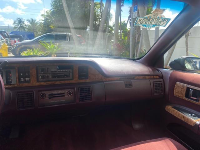 1993 Black /Red Chevrolet Caprice Classic STATON WAGON 1 OWNER (1G1BL8375PW) with an 5.7L V8 F OHV 16V engine, Automatic transmission, located at 4701 North Dixie Hwy, Pompano Beach, FL, 33064, (954) 422-2889, 26.240938, -80.123474 - OUR WEBPAGE FLORIDACARS1.COM HAS OVER 100 PHOTOS AND FREE CARFAX LINK 1993 Chevrolet Caprice -1 OWNER STATION WAGON REAR JUMP SEAT INCLUDED - NO ACCIDENTS EVER - VERY HARD COLOR COMBO TO FIND BLACK EXTERIOR RED INTERIOR Wagon 4 DR 5.7L V8 F OHV 16V Gasoline Rear Wheel Drive Features ABS Brakes Air C - Photo#78