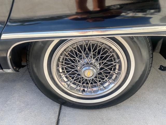 1993 Black /Red Chevrolet Caprice Classic STATON WAGON 1 OWNER (1G1BL8375PW) with an 5.7L V8 F OHV 16V engine, Automatic transmission, located at 4701 North Dixie Hwy, Pompano Beach, FL, 33064, (954) 422-2889, 26.240938, -80.123474 - OUR WEBPAGE FLORIDACARS1.COM HAS OVER 100 PHOTOS AND FREE CARFAX LINK 1993 Chevrolet Caprice -1 OWNER STATION WAGON REAR JUMP SEAT INCLUDED - NO ACCIDENTS EVER - VERY HARD COLOR COMBO TO FIND BLACK EXTERIOR RED INTERIOR Wagon 4 DR 5.7L V8 F OHV 16V Gasoline Rear Wheel Drive Features ABS Brakes Air C - Photo#80