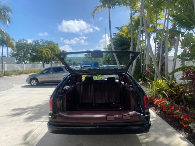 1993 Black /Red Chevrolet Caprice Classic STATON WAGON 1 OWNER (1G1BL8375PW) with an 5.7L V8 F OHV 16V engine, Automatic transmission, located at 4701 North Dixie Hwy, Pompano Beach, FL, 33064, (954) 422-2889, 26.240938, -80.123474 - OUR WEBPAGE FLORIDACARS1.COM HAS OVER 100 PHOTOS AND FREE CARFAX LINK 1993 Chevrolet Caprice -1 OWNER STATION WAGON REAR JUMP SEAT INCLUDED - NO ACCIDENTS EVER - VERY HARD COLOR COMBO TO FIND BLACK EXTERIOR RED INTERIOR Wagon 4 DR 5.7L V8 F OHV 16V Gasoline Rear Wheel Drive Features ABS Brakes Air C - Photo#89