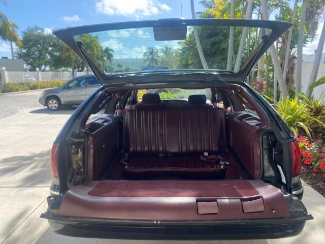 1993 Black /Red Chevrolet Caprice Classic STATON WAGON 1 OWNER (1G1BL8375PW) with an 5.7L V8 F OHV 16V engine, Automatic transmission, located at 4701 North Dixie Hwy, Pompano Beach, FL, 33064, (954) 422-2889, 26.240938, -80.123474 - OUR WEBPAGE FLORIDACARS1.COM HAS OVER 100 PHOTOS AND FREE CARFAX LINK 1993 Chevrolet Caprice -1 OWNER STATION WAGON REAR JUMP SEAT INCLUDED - NO ACCIDENTS EVER - VERY HARD COLOR COMBO TO FIND BLACK EXTERIOR RED INTERIOR Wagon 4 DR 5.7L V8 F OHV 16V Gasoline Rear Wheel Drive Features ABS Brakes Air C - Photo#90