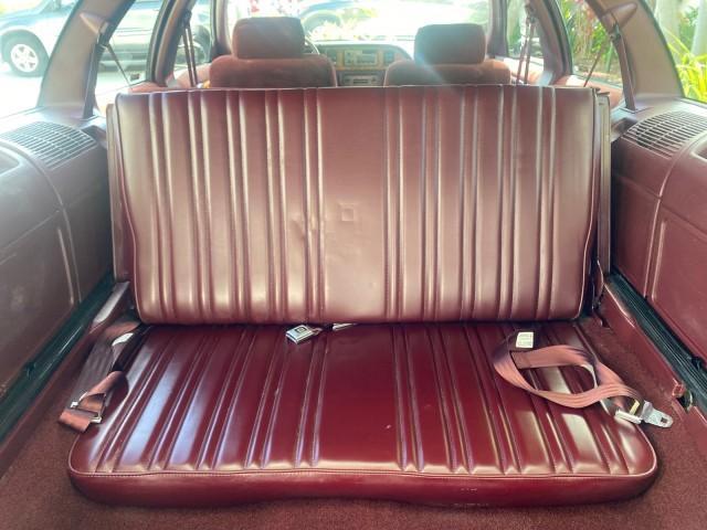 1993 Black /Red Chevrolet Caprice Classic STATON WAGON 1 OWNER (1G1BL8375PW) with an 5.7L V8 F OHV 16V engine, Automatic transmission, located at 4701 North Dixie Hwy, Pompano Beach, FL, 33064, (954) 422-2889, 26.240938, -80.123474 - OUR WEBPAGE FLORIDACARS1.COM HAS OVER 100 PHOTOS AND FREE CARFAX LINK 1993 Chevrolet Caprice -1 OWNER STATION WAGON REAR JUMP SEAT INCLUDED - NO ACCIDENTS EVER - VERY HARD COLOR COMBO TO FIND BLACK EXTERIOR RED INTERIOR Wagon 4 DR 5.7L V8 F OHV 16V Gasoline Rear Wheel Drive Features ABS Brakes Air C - Photo#94