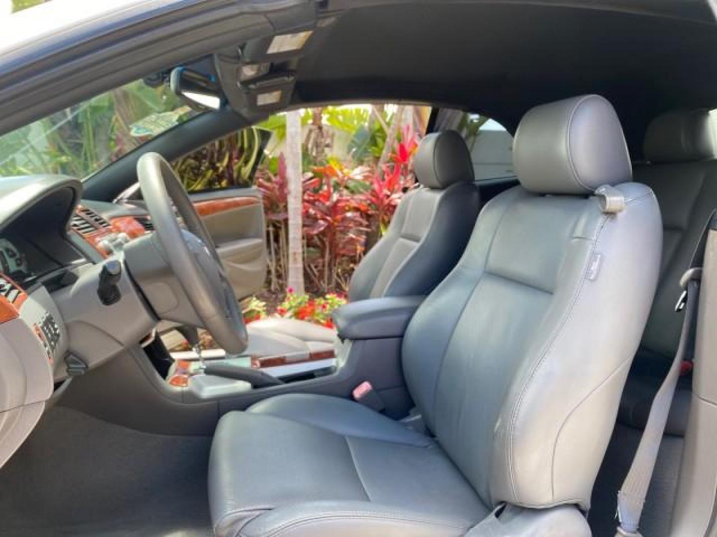 2006 Lunar Mist Metallic /Dark Stone Toyota Camry Solara SLE V6 LOW MILES 54,978 1 OWNER (4T1FA38P36U) with an 3.3L DOHC SMPI 24-Valve V6 Engine engine, Automatic transmission, located at 4701 North Dixie Hwy, Pompano Beach, FL, 33064, (954) 422-2889, 26.240938, -80.123474 - OUR WEBPAGE FLORIDACARS1.COM HAS OVER 100 PHOTOS AND FREE CARFAX LINK 2006 Toyota Camry Solara SLE V6 1 OWNER LEATHER LOADED ABSOLUTELY NO CRACKS ON THE DASH Convertible 3.3L V6 F DOHC 24V Gasoline 28 MPG Front Wheel Drive Features ABS Brakes Air Conditioning Alloy Wheels AM/FM Stereo Automatic Tran - Photo#14