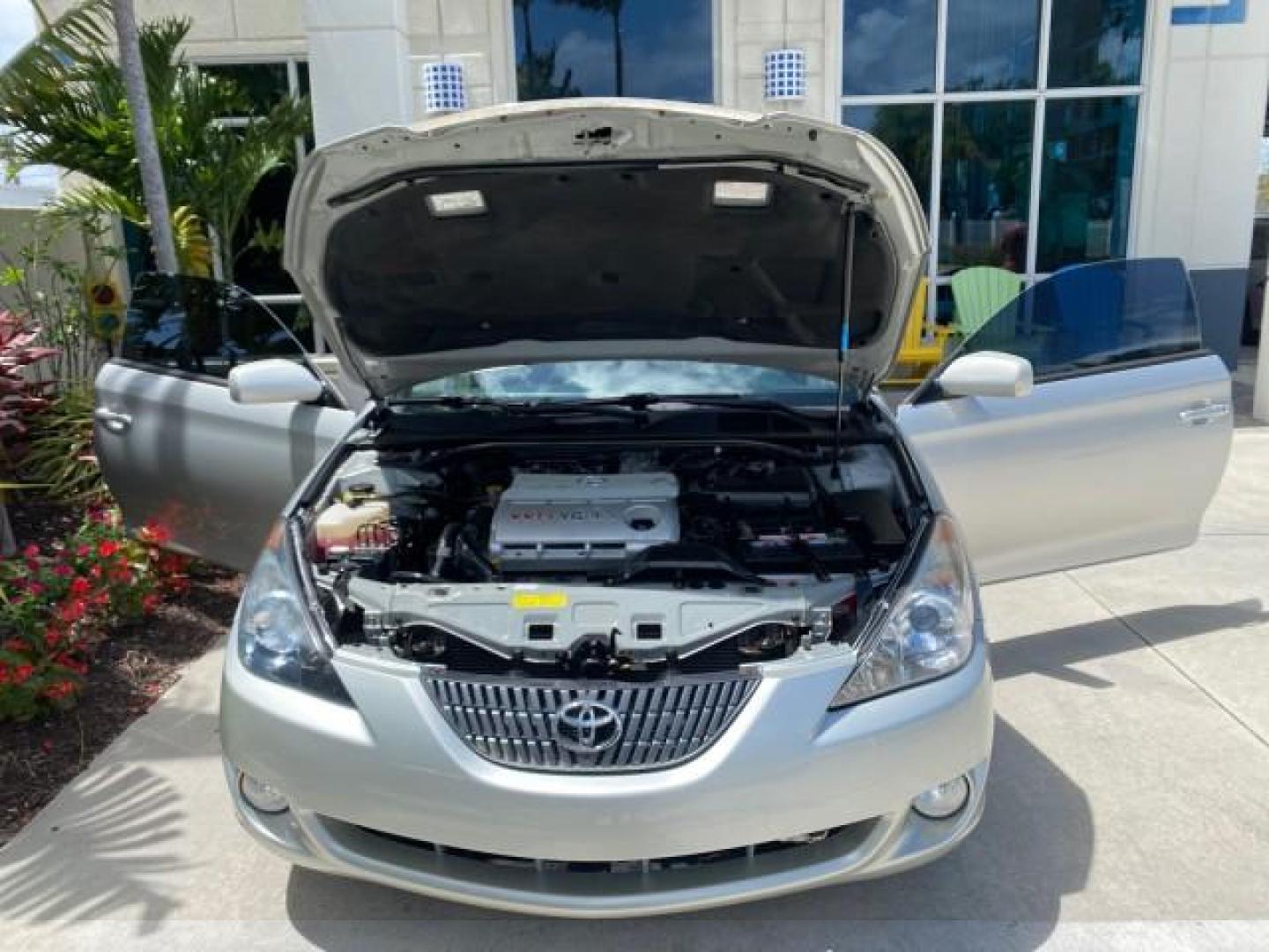 2006 Lunar Mist Metallic /Dark Stone Toyota Camry Solara SLE V6 LOW MILES 54,978 1 OWNER (4T1FA38P36U) with an 3.3L DOHC SMPI 24-Valve V6 Engine engine, Automatic transmission, located at 4701 North Dixie Hwy, Pompano Beach, FL, 33064, (954) 422-2889, 26.240938, -80.123474 - OUR WEBPAGE FLORIDACARS1.COM HAS OVER 100 PHOTOS AND FREE CARFAX LINK 2006 Toyota Camry Solara SLE V6 1 OWNER LEATHER LOADED ABSOLUTELY NO CRACKS ON THE DASH Convertible 3.3L V6 F DOHC 24V Gasoline 28 MPG Front Wheel Drive Features ABS Brakes Air Conditioning Alloy Wheels AM/FM Stereo Automatic Tran - Photo#16