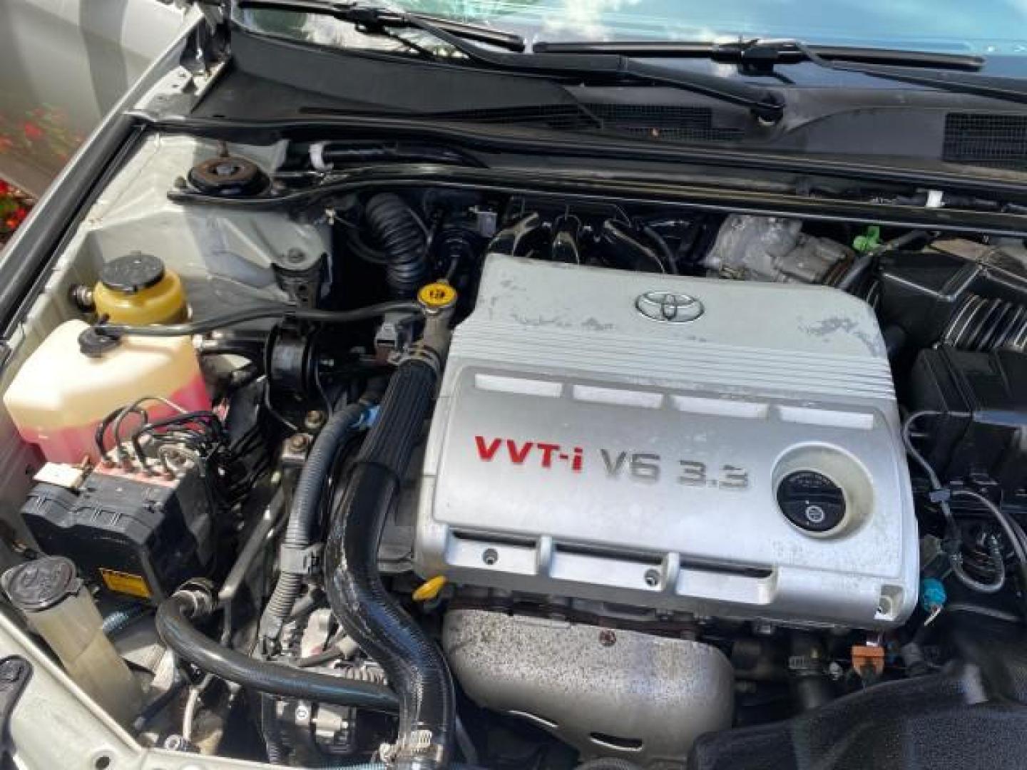 2006 Lunar Mist Metallic /Dark Stone Toyota Camry Solara SLE V6 LOW MILES 54,978 1 OWNER (4T1FA38P36U) with an 3.3L DOHC SMPI 24-Valve V6 Engine engine, Automatic transmission, located at 4701 North Dixie Hwy, Pompano Beach, FL, 33064, (954) 422-2889, 26.240938, -80.123474 - OUR WEBPAGE FLORIDACARS1.COM HAS OVER 100 PHOTOS AND FREE CARFAX LINK 2006 Toyota Camry Solara SLE V6 1 OWNER LEATHER LOADED ABSOLUTELY NO CRACKS ON THE DASH Convertible 3.3L V6 F DOHC 24V Gasoline 28 MPG Front Wheel Drive Features ABS Brakes Air Conditioning Alloy Wheels AM/FM Stereo Automatic Tran - Photo#24