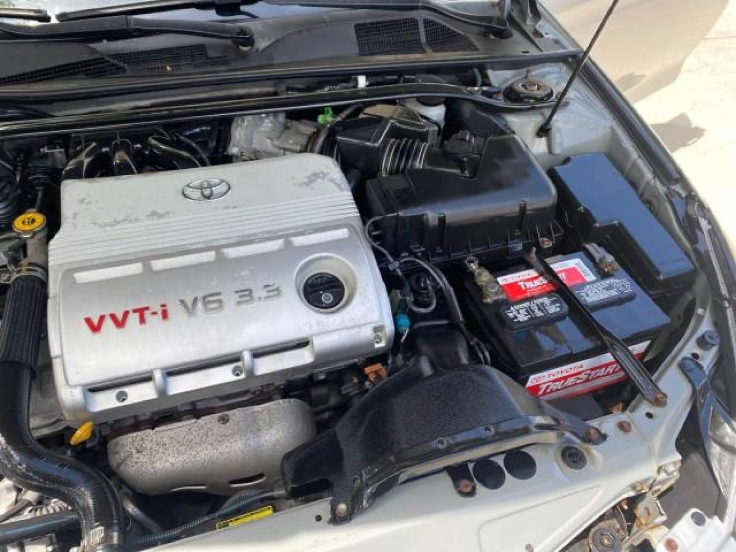 2006 Lunar Mist Metallic /Dark Stone Toyota Camry Solara SLE V6 LOW MILES 54,978 1 OWNER (4T1FA38P36U) with an 3.3L DOHC SMPI 24-Valve V6 Engine engine, Automatic transmission, located at 4701 North Dixie Hwy, Pompano Beach, FL, 33064, (954) 422-2889, 26.240938, -80.123474 - OUR WEBPAGE FLORIDACARS1.COM HAS OVER 100 PHOTOS AND FREE CARFAX LINK 2006 Toyota Camry Solara SLE V6 1 OWNER LEATHER LOADED ABSOLUTELY NO CRACKS ON THE DASH Convertible 3.3L V6 F DOHC 24V Gasoline 28 MPG Front Wheel Drive Features ABS Brakes Air Conditioning Alloy Wheels AM/FM Stereo Automatic Tran - Photo#25