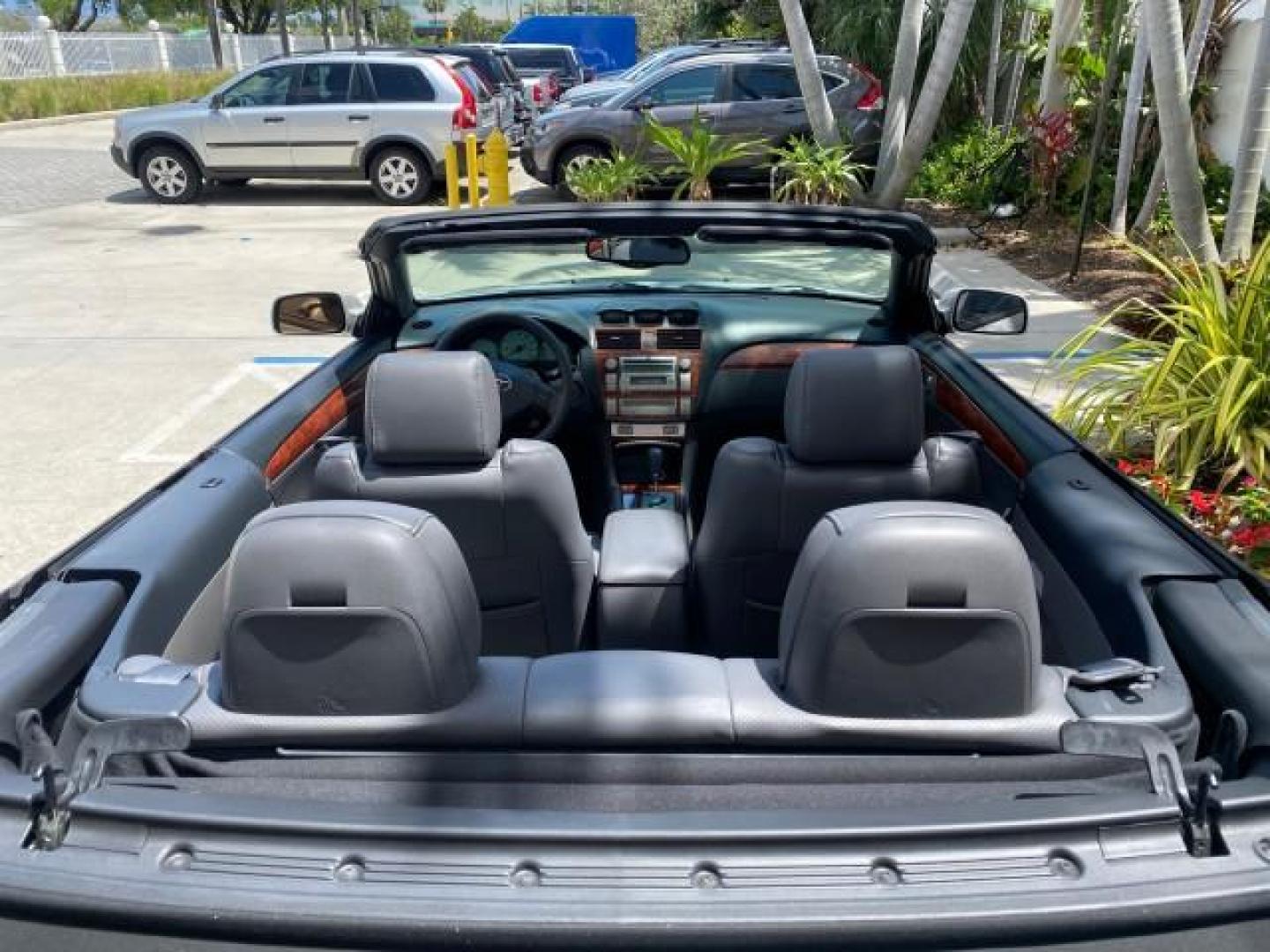 2006 Lunar Mist Metallic /Dark Stone Toyota Camry Solara SLE V6 LOW MILES 54,978 1 OWNER (4T1FA38P36U) with an 3.3L DOHC SMPI 24-Valve V6 Engine engine, Automatic transmission, located at 4701 North Dixie Hwy, Pompano Beach, FL, 33064, (954) 422-2889, 26.240938, -80.123474 - OUR WEBPAGE FLORIDACARS1.COM HAS OVER 100 PHOTOS AND FREE CARFAX LINK 2006 Toyota Camry Solara SLE V6 1 OWNER LEATHER LOADED ABSOLUTELY NO CRACKS ON THE DASH Convertible 3.3L V6 F DOHC 24V Gasoline 28 MPG Front Wheel Drive Features ABS Brakes Air Conditioning Alloy Wheels AM/FM Stereo Automatic Tran - Photo#46