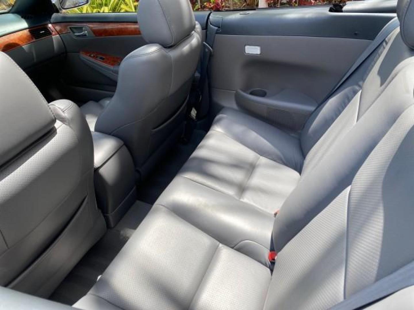 2006 Lunar Mist Metallic /Dark Stone Toyota Camry Solara SLE V6 LOW MILES 54,978 1 OWNER (4T1FA38P36U) with an 3.3L DOHC SMPI 24-Valve V6 Engine engine, Automatic transmission, located at 4701 North Dixie Hwy, Pompano Beach, FL, 33064, (954) 422-2889, 26.240938, -80.123474 - OUR WEBPAGE FLORIDACARS1.COM HAS OVER 100 PHOTOS AND FREE CARFAX LINK 2006 Toyota Camry Solara SLE V6 1 OWNER LEATHER LOADED ABSOLUTELY NO CRACKS ON THE DASH Convertible 3.3L V6 F DOHC 24V Gasoline 28 MPG Front Wheel Drive Features ABS Brakes Air Conditioning Alloy Wheels AM/FM Stereo Automatic Tran - Photo#47