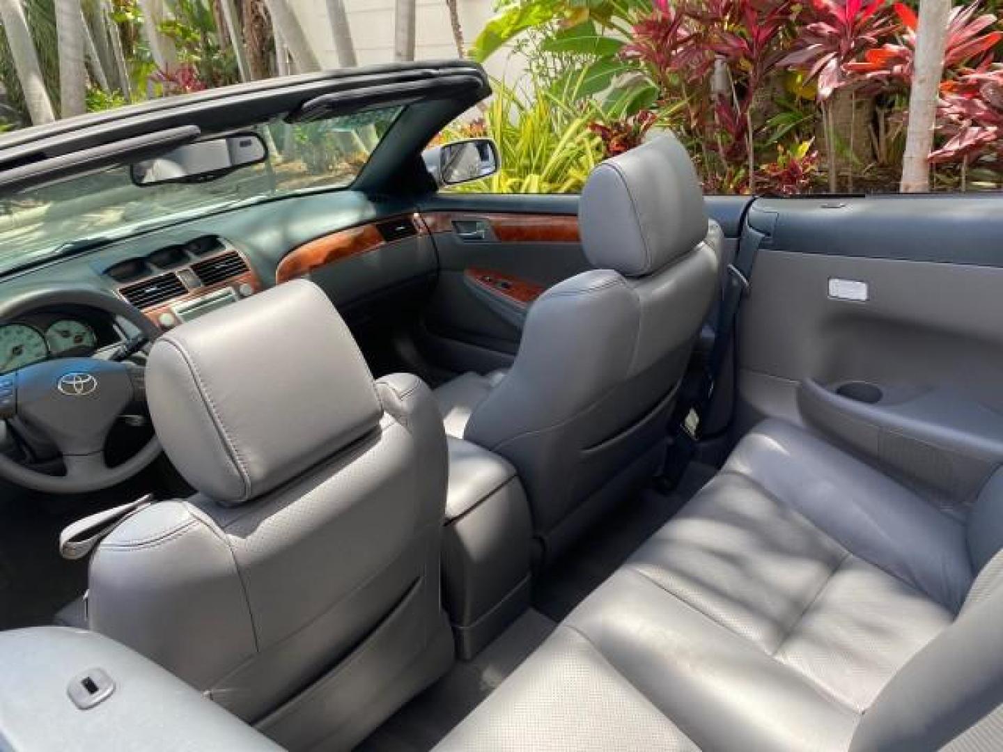 2006 Lunar Mist Metallic /Dark Stone Toyota Camry Solara SLE V6 LOW MILES 54,978 1 OWNER (4T1FA38P36U) with an 3.3L DOHC SMPI 24-Valve V6 Engine engine, Automatic transmission, located at 4701 North Dixie Hwy, Pompano Beach, FL, 33064, (954) 422-2889, 26.240938, -80.123474 - OUR WEBPAGE FLORIDACARS1.COM HAS OVER 100 PHOTOS AND FREE CARFAX LINK 2006 Toyota Camry Solara SLE V6 1 OWNER LEATHER LOADED ABSOLUTELY NO CRACKS ON THE DASH Convertible 3.3L V6 F DOHC 24V Gasoline 28 MPG Front Wheel Drive Features ABS Brakes Air Conditioning Alloy Wheels AM/FM Stereo Automatic Tran - Photo#48