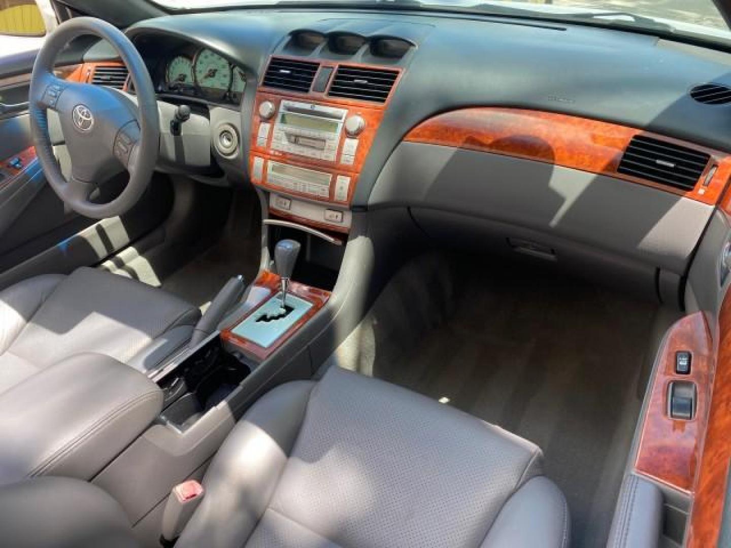 2006 Lunar Mist Metallic /Dark Stone Toyota Camry Solara SLE V6 LOW MILES 54,978 1 OWNER (4T1FA38P36U) with an 3.3L DOHC SMPI 24-Valve V6 Engine engine, Automatic transmission, located at 4701 North Dixie Hwy, Pompano Beach, FL, 33064, (954) 422-2889, 26.240938, -80.123474 - OUR WEBPAGE FLORIDACARS1.COM HAS OVER 100 PHOTOS AND FREE CARFAX LINK 2006 Toyota Camry Solara SLE V6 1 OWNER LEATHER LOADED ABSOLUTELY NO CRACKS ON THE DASH Convertible 3.3L V6 F DOHC 24V Gasoline 28 MPG Front Wheel Drive Features ABS Brakes Air Conditioning Alloy Wheels AM/FM Stereo Automatic Tran - Photo#51