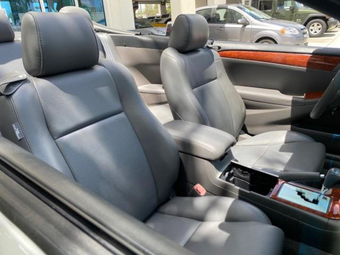 2006 Lunar Mist Metallic /Dark Stone Toyota Camry Solara SLE V6 LOW MILES 54,978 1 OWNER (4T1FA38P36U) with an 3.3L DOHC SMPI 24-Valve V6 Engine engine, Automatic transmission, located at 4701 North Dixie Hwy, Pompano Beach, FL, 33064, (954) 422-2889, 26.240938, -80.123474 - OUR WEBPAGE FLORIDACARS1.COM HAS OVER 100 PHOTOS AND FREE CARFAX LINK 2006 Toyota Camry Solara SLE V6 1 OWNER LEATHER LOADED ABSOLUTELY NO CRACKS ON THE DASH Convertible 3.3L V6 F DOHC 24V Gasoline 28 MPG Front Wheel Drive Features ABS Brakes Air Conditioning Alloy Wheels AM/FM Stereo Automatic Tran - Photo#54