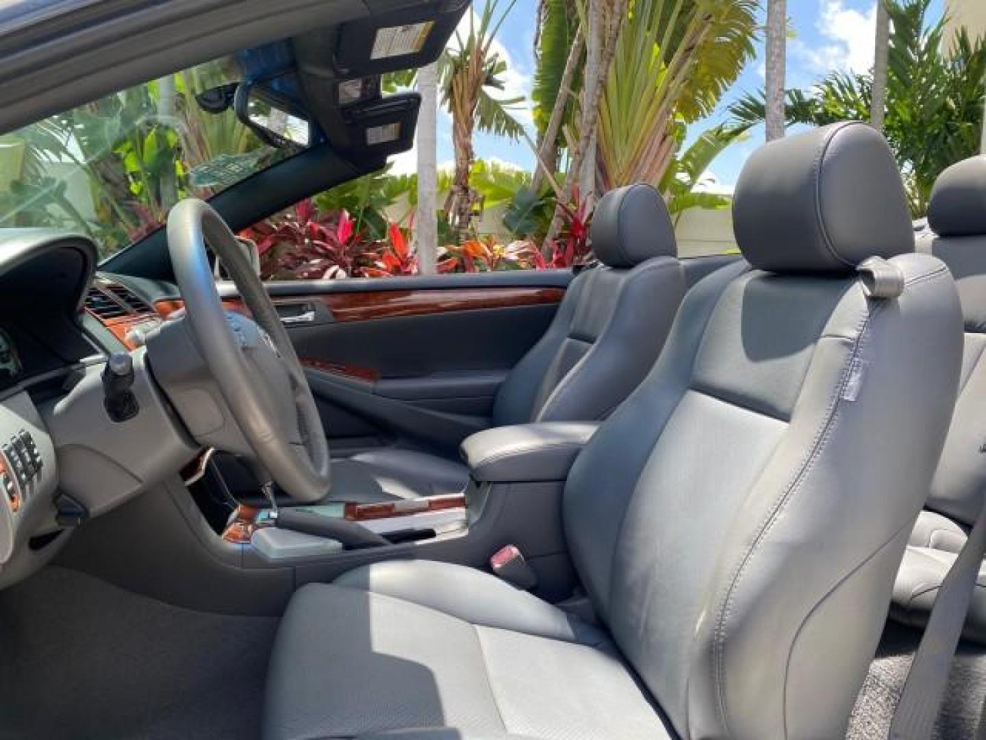2006 Lunar Mist Metallic /Dark Stone Toyota Camry Solara SLE V6 LOW MILES 54,978 1 OWNER (4T1FA38P36U) with an 3.3L DOHC SMPI 24-Valve V6 Engine engine, Automatic transmission, located at 4701 North Dixie Hwy, Pompano Beach, FL, 33064, (954) 422-2889, 26.240938, -80.123474 - OUR WEBPAGE FLORIDACARS1.COM HAS OVER 100 PHOTOS AND FREE CARFAX LINK 2006 Toyota Camry Solara SLE V6 1 OWNER LEATHER LOADED ABSOLUTELY NO CRACKS ON THE DASH Convertible 3.3L V6 F DOHC 24V Gasoline 28 MPG Front Wheel Drive Features ABS Brakes Air Conditioning Alloy Wheels AM/FM Stereo Automatic Tran - Photo#61
