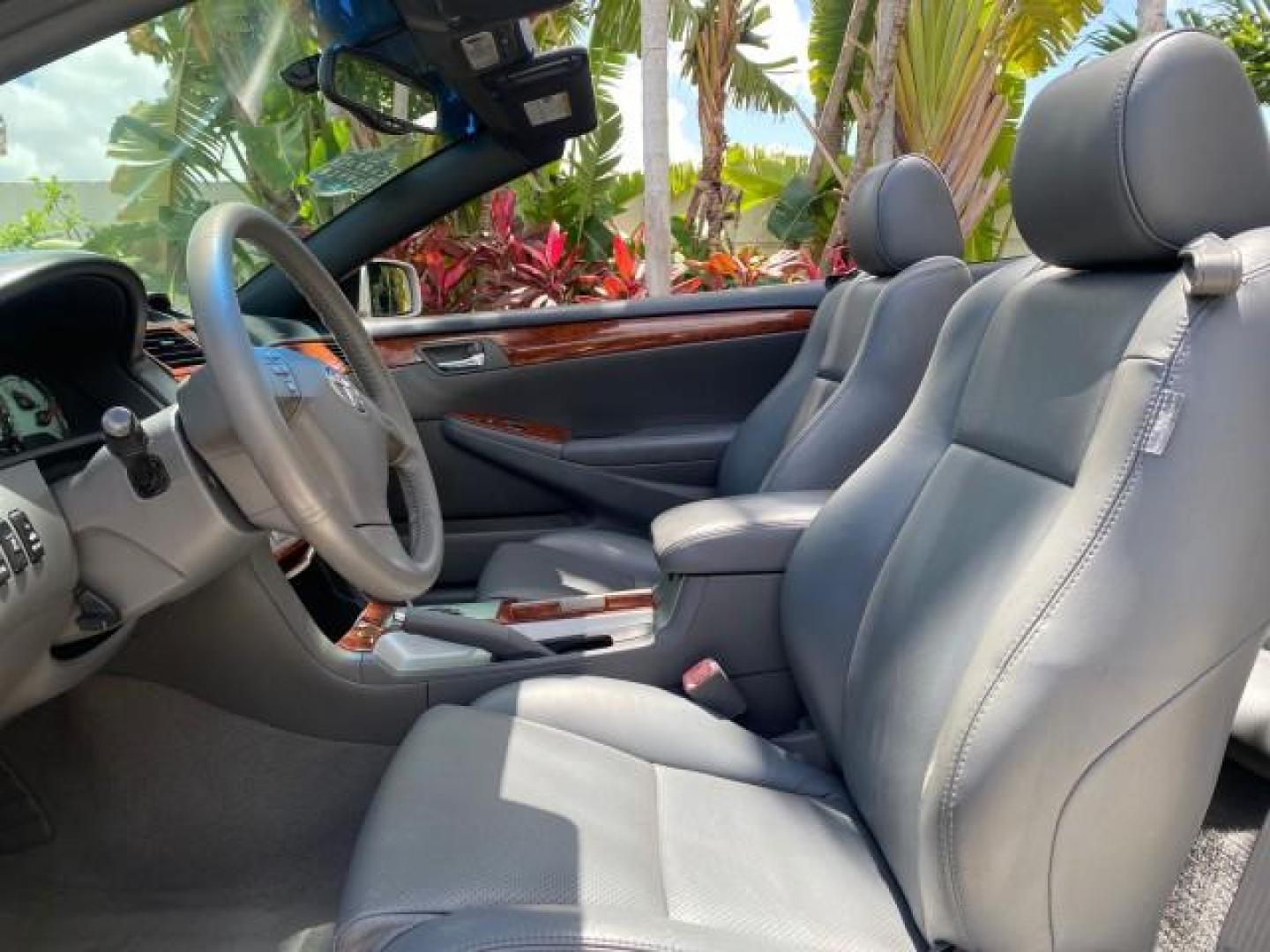 2006 Lunar Mist Metallic /Dark Stone Toyota Camry Solara SLE V6 LOW MILES 54,978 1 OWNER (4T1FA38P36U) with an 3.3L DOHC SMPI 24-Valve V6 Engine engine, Automatic transmission, located at 4701 North Dixie Hwy, Pompano Beach, FL, 33064, (954) 422-2889, 26.240938, -80.123474 - OUR WEBPAGE FLORIDACARS1.COM HAS OVER 100 PHOTOS AND FREE CARFAX LINK 2006 Toyota Camry Solara SLE V6 1 OWNER LEATHER LOADED ABSOLUTELY NO CRACKS ON THE DASH Convertible 3.3L V6 F DOHC 24V Gasoline 28 MPG Front Wheel Drive Features ABS Brakes Air Conditioning Alloy Wheels AM/FM Stereo Automatic Tran - Photo#62