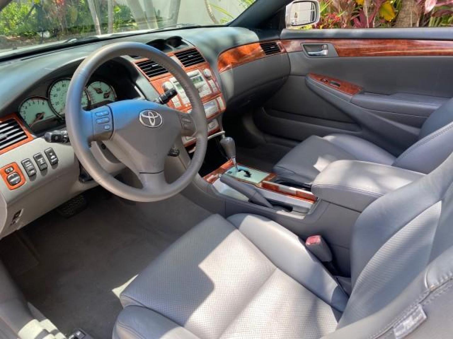 2006 Lunar Mist Metallic /Dark Stone Toyota Camry Solara SLE V6 LOW MILES 54,978 1 OWNER (4T1FA38P36U) with an 3.3L DOHC SMPI 24-Valve V6 Engine engine, Automatic transmission, located at 4701 North Dixie Hwy, Pompano Beach, FL, 33064, (954) 422-2889, 26.240938, -80.123474 - OUR WEBPAGE FLORIDACARS1.COM HAS OVER 100 PHOTOS AND FREE CARFAX LINK 2006 Toyota Camry Solara SLE V6 1 OWNER LEATHER LOADED ABSOLUTELY NO CRACKS ON THE DASH Convertible 3.3L V6 F DOHC 24V Gasoline 28 MPG Front Wheel Drive Features ABS Brakes Air Conditioning Alloy Wheels AM/FM Stereo Automatic Tran - Photo#64