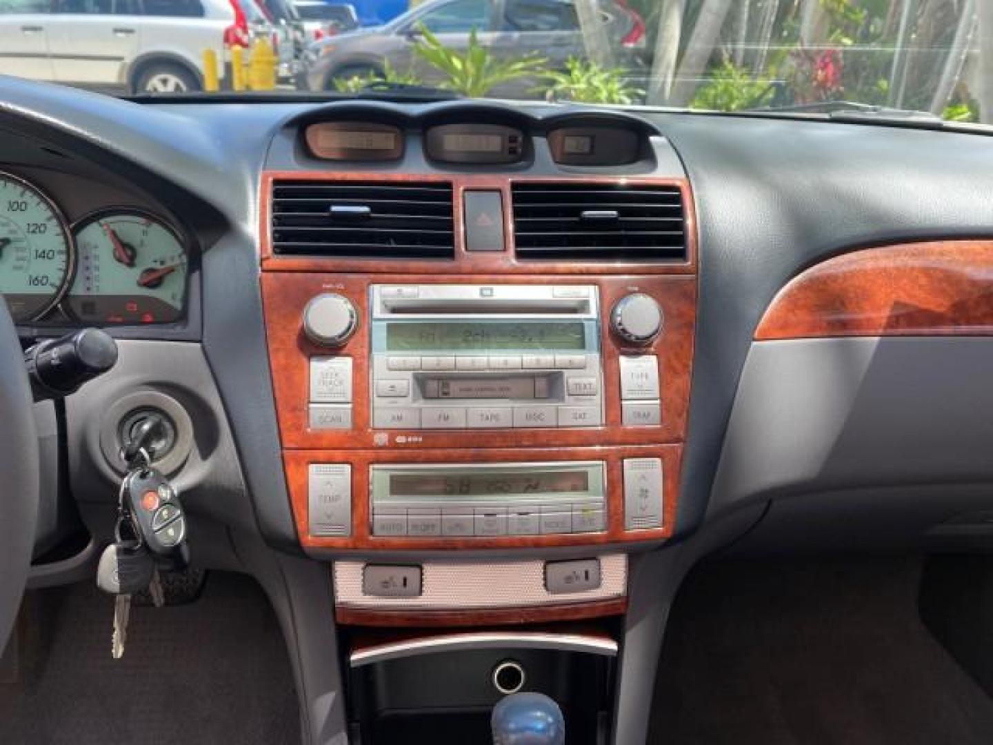 2006 Lunar Mist Metallic /Dark Stone Toyota Camry Solara SLE V6 LOW MILES 54,978 1 OWNER (4T1FA38P36U) with an 3.3L DOHC SMPI 24-Valve V6 Engine engine, Automatic transmission, located at 4701 North Dixie Hwy, Pompano Beach, FL, 33064, (954) 422-2889, 26.240938, -80.123474 - OUR WEBPAGE FLORIDACARS1.COM HAS OVER 100 PHOTOS AND FREE CARFAX LINK 2006 Toyota Camry Solara SLE V6 1 OWNER LEATHER LOADED ABSOLUTELY NO CRACKS ON THE DASH Convertible 3.3L V6 F DOHC 24V Gasoline 28 MPG Front Wheel Drive Features ABS Brakes Air Conditioning Alloy Wheels AM/FM Stereo Automatic Tran - Photo#76