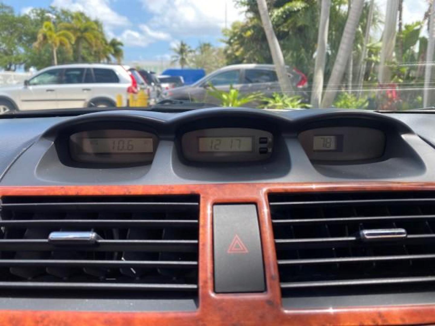 2006 Lunar Mist Metallic /Dark Stone Toyota Camry Solara SLE V6 LOW MILES 54,978 1 OWNER (4T1FA38P36U) with an 3.3L DOHC SMPI 24-Valve V6 Engine engine, Automatic transmission, located at 4701 North Dixie Hwy, Pompano Beach, FL, 33064, (954) 422-2889, 26.240938, -80.123474 - OUR WEBPAGE FLORIDACARS1.COM HAS OVER 100 PHOTOS AND FREE CARFAX LINK 2006 Toyota Camry Solara SLE V6 1 OWNER LEATHER LOADED ABSOLUTELY NO CRACKS ON THE DASH Convertible 3.3L V6 F DOHC 24V Gasoline 28 MPG Front Wheel Drive Features ABS Brakes Air Conditioning Alloy Wheels AM/FM Stereo Automatic Tran - Photo#77