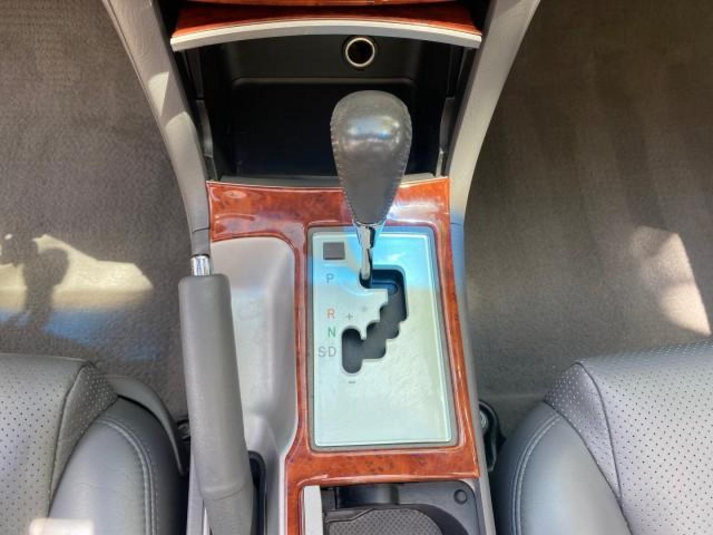 2006 Lunar Mist Metallic /Dark Stone Toyota Camry Solara SLE V6 LOW MILES 54,978 1 OWNER (4T1FA38P36U) with an 3.3L DOHC SMPI 24-Valve V6 Engine engine, Automatic transmission, located at 4701 North Dixie Hwy, Pompano Beach, FL, 33064, (954) 422-2889, 26.240938, -80.123474 - OUR WEBPAGE FLORIDACARS1.COM HAS OVER 100 PHOTOS AND FREE CARFAX LINK 2006 Toyota Camry Solara SLE V6 1 OWNER LEATHER LOADED ABSOLUTELY NO CRACKS ON THE DASH Convertible 3.3L V6 F DOHC 24V Gasoline 28 MPG Front Wheel Drive Features ABS Brakes Air Conditioning Alloy Wheels AM/FM Stereo Automatic Tran - Photo#81