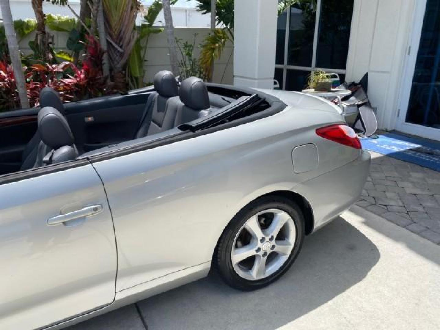 2006 Lunar Mist Metallic /Dark Stone Toyota Camry Solara SLE V6 LOW MILES 54,978 1 OWNER (4T1FA38P36U) with an 3.3L DOHC SMPI 24-Valve V6 Engine engine, Automatic transmission, located at 4701 North Dixie Hwy, Pompano Beach, FL, 33064, (954) 422-2889, 26.240938, -80.123474 - OUR WEBPAGE FLORIDACARS1.COM HAS OVER 100 PHOTOS AND FREE CARFAX LINK 2006 Toyota Camry Solara SLE V6 1 OWNER LEATHER LOADED ABSOLUTELY NO CRACKS ON THE DASH Convertible 3.3L V6 F DOHC 24V Gasoline 28 MPG Front Wheel Drive Features ABS Brakes Air Conditioning Alloy Wheels AM/FM Stereo Automatic Tran - Photo#99