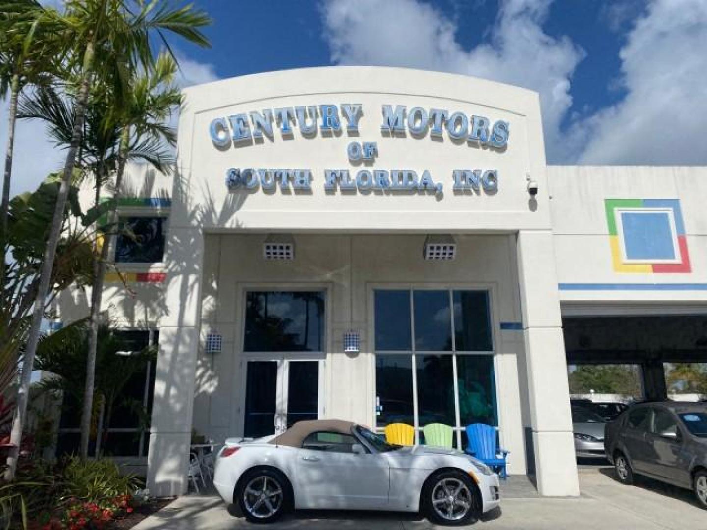 2007 Polar White /Tan Saturn Sky LOW MILES 21,329 5 SPEED MANUAL (1G8MB35B47Y) with an 2.4L DOHC VVT I4 Aluminum Ecotec Engine engine, Manual transmission, located at 4701 North Dixie Hwy, Pompano Beach, FL, 33064, (954) 422-2889, 26.240938, -80.123474 - OUR WEBPAGE FLORIDACARS1.COM HAS OVER 100 PHOTOS AND FREE CARFAX LINK 2007 Saturn SKY 5 SPEED MANUAL Convertible 2.4L I4 F DOHC Gasoline 28 MPG Rear Wheel Drive Features ABS Brakes Air Conditioning Alloy Wheels AM/FM Stereo Auxiliary Audio Input CD Audio Cruise Control Leather Seats Manual Transmiss - Photo#0