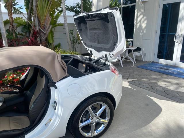 2007 Polar White /Tan Saturn Sky LOW MILES 21,329 5 SPEED MANUAL (1G8MB35B47Y) with an 2.4L DOHC VVT I4 Aluminum Ecotec Engine engine, Manual transmission, located at 4701 North Dixie Hwy, Pompano Beach, FL, 33064, (954) 422-2889, 26.240938, -80.123474 - OUR WEBPAGE FLORIDACARS1.COM HAS OVER 100 PHOTOS AND FREE CARFAX LINK 2007 Saturn SKY 5 SPEED MANUAL Convertible 2.4L I4 F DOHC Gasoline 28 MPG Rear Wheel Drive Features ABS Brakes Air Conditioning Alloy Wheels AM/FM Stereo Auxiliary Audio Input CD Audio Cruise Control Leather Seats Manual Transmiss - Photo#13