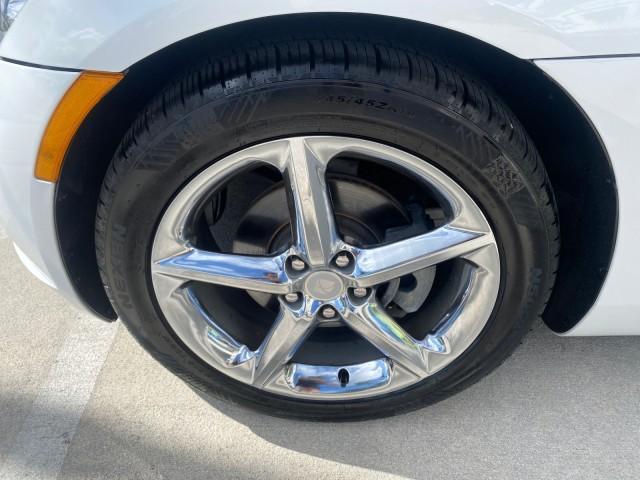 2007 Polar White /Tan Saturn Sky LOW MILES 21,329 5 SPEED MANUAL (1G8MB35B47Y) with an 2.4L DOHC VVT I4 Aluminum Ecotec Engine engine, Manual transmission, located at 4701 North Dixie Hwy, Pompano Beach, FL, 33064, (954) 422-2889, 26.240938, -80.123474 - OUR WEBPAGE FLORIDACARS1.COM HAS OVER 100 PHOTOS AND FREE CARFAX LINK 2007 Saturn SKY 5 SPEED MANUAL Convertible 2.4L I4 F DOHC Gasoline 28 MPG Rear Wheel Drive Features ABS Brakes Air Conditioning Alloy Wheels AM/FM Stereo Auxiliary Audio Input CD Audio Cruise Control Leather Seats Manual Transmiss - Photo#19