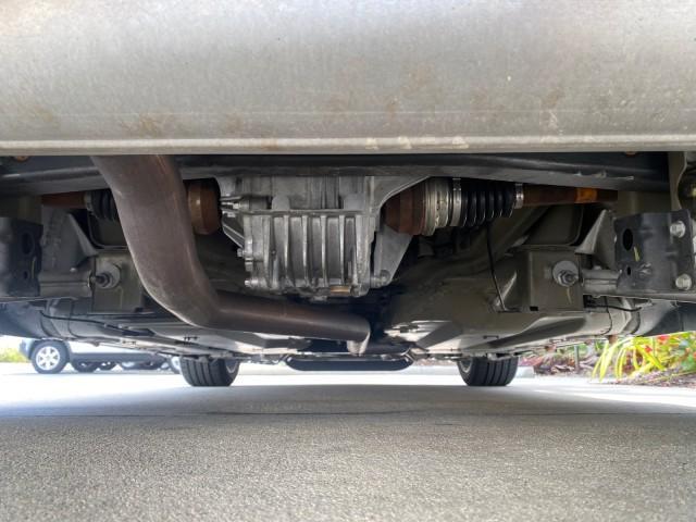 2007 Polar White /Tan Saturn Sky LOW MILES 21,329 5 SPEED MANUAL (1G8MB35B47Y) with an 2.4L DOHC VVT I4 Aluminum Ecotec Engine engine, Manual transmission, located at 4701 North Dixie Hwy, Pompano Beach, FL, 33064, (954) 422-2889, 26.240938, -80.123474 - OUR WEBPAGE FLORIDACARS1.COM HAS OVER 100 PHOTOS AND FREE CARFAX LINK 2007 Saturn SKY 5 SPEED MANUAL Convertible 2.4L I4 F DOHC Gasoline 28 MPG Rear Wheel Drive Features ABS Brakes Air Conditioning Alloy Wheels AM/FM Stereo Auxiliary Audio Input CD Audio Cruise Control Leather Seats Manual Transmiss - Photo#22