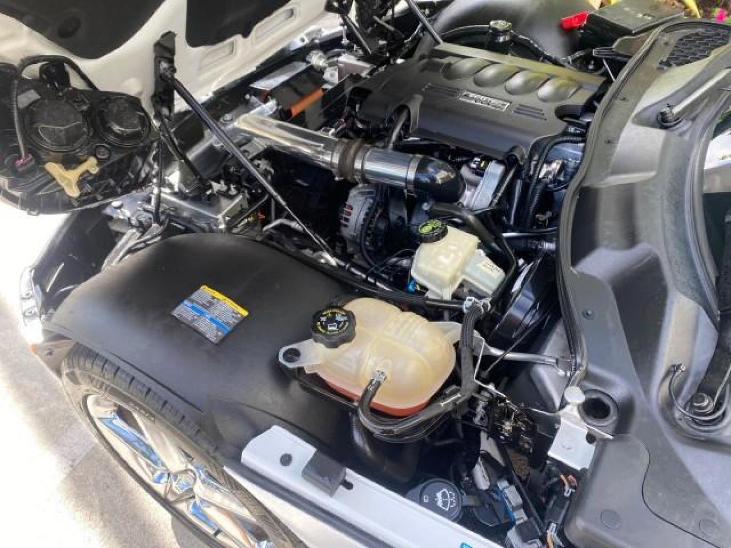 2007 Polar White /Tan Saturn Sky LOW MILES 21,329 5 SPEED MANUAL (1G8MB35B47Y) with an 2.4L DOHC VVT I4 Aluminum Ecotec Engine engine, Manual transmission, located at 4701 North Dixie Hwy, Pompano Beach, FL, 33064, (954) 422-2889, 26.240938, -80.123474 - OUR WEBPAGE FLORIDACARS1.COM HAS OVER 100 PHOTOS AND FREE CARFAX LINK 2007 Saturn SKY 5 SPEED MANUAL Convertible 2.4L I4 F DOHC Gasoline 28 MPG Rear Wheel Drive Features ABS Brakes Air Conditioning Alloy Wheels AM/FM Stereo Auxiliary Audio Input CD Audio Cruise Control Leather Seats Manual Transmiss - Photo#24