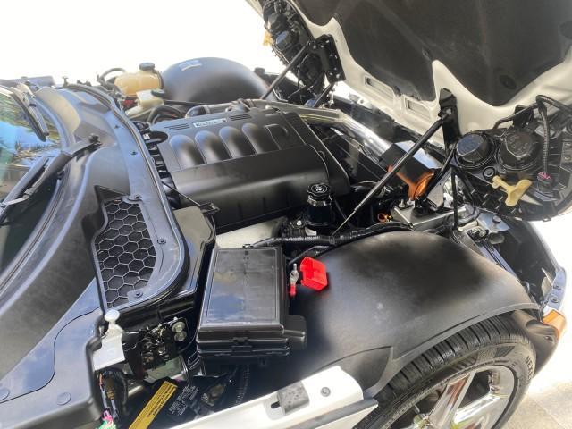 2007 Polar White /Tan Saturn Sky LOW MILES 21,329 5 SPEED MANUAL (1G8MB35B47Y) with an 2.4L DOHC VVT I4 Aluminum Ecotec Engine engine, Manual transmission, located at 4701 North Dixie Hwy, Pompano Beach, FL, 33064, (954) 422-2889, 26.240938, -80.123474 - OUR WEBPAGE FLORIDACARS1.COM HAS OVER 100 PHOTOS AND FREE CARFAX LINK 2007 Saturn SKY 5 SPEED MANUAL Convertible 2.4L I4 F DOHC Gasoline 28 MPG Rear Wheel Drive Features ABS Brakes Air Conditioning Alloy Wheels AM/FM Stereo Auxiliary Audio Input CD Audio Cruise Control Leather Seats Manual Transmiss - Photo#25