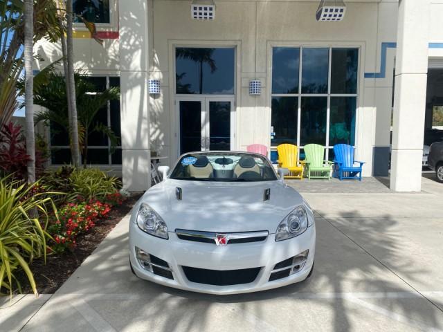 2007 Polar White /Tan Saturn Sky LOW MILES 21,329 5 SPEED MANUAL (1G8MB35B47Y) with an 2.4L DOHC VVT I4 Aluminum Ecotec Engine engine, Manual transmission, located at 4701 North Dixie Hwy, Pompano Beach, FL, 33064, (954) 422-2889, 26.240938, -80.123474 - OUR WEBPAGE FLORIDACARS1.COM HAS OVER 100 PHOTOS AND FREE CARFAX LINK 2007 Saturn SKY 5 SPEED MANUAL Convertible 2.4L I4 F DOHC Gasoline 28 MPG Rear Wheel Drive Features ABS Brakes Air Conditioning Alloy Wheels AM/FM Stereo Auxiliary Audio Input CD Audio Cruise Control Leather Seats Manual Transmiss - Photo#36