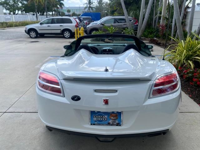 2007 Polar White /Tan Saturn Sky LOW MILES 21,329 5 SPEED MANUAL (1G8MB35B47Y) with an 2.4L DOHC VVT I4 Aluminum Ecotec Engine engine, Manual transmission, located at 4701 North Dixie Hwy, Pompano Beach, FL, 33064, (954) 422-2889, 26.240938, -80.123474 - OUR WEBPAGE FLORIDACARS1.COM HAS OVER 100 PHOTOS AND FREE CARFAX LINK 2007 Saturn SKY 5 SPEED MANUAL Convertible 2.4L I4 F DOHC Gasoline 28 MPG Rear Wheel Drive Features ABS Brakes Air Conditioning Alloy Wheels AM/FM Stereo Auxiliary Audio Input CD Audio Cruise Control Leather Seats Manual Transmiss - Photo#45