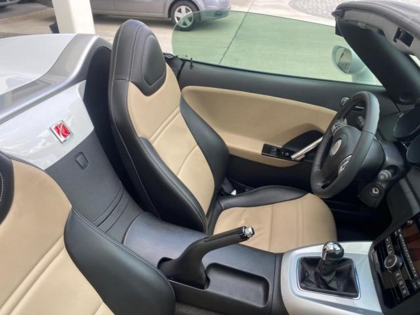 2007 Polar White /Tan Saturn Sky LOW MILES 21,329 5 SPEED MANUAL (1G8MB35B47Y) with an 2.4L DOHC VVT I4 Aluminum Ecotec Engine engine, Manual transmission, located at 4701 North Dixie Hwy, Pompano Beach, FL, 33064, (954) 422-2889, 26.240938, -80.123474 - OUR WEBPAGE FLORIDACARS1.COM HAS OVER 100 PHOTOS AND FREE CARFAX LINK 2007 Saturn SKY 5 SPEED MANUAL Convertible 2.4L I4 F DOHC Gasoline 28 MPG Rear Wheel Drive Features ABS Brakes Air Conditioning Alloy Wheels AM/FM Stereo Auxiliary Audio Input CD Audio Cruise Control Leather Seats Manual Transmiss - Photo#51
