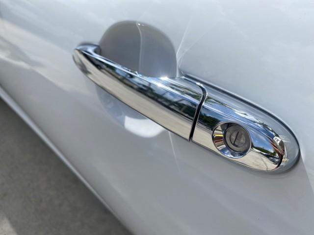 2007 Polar White /Tan Saturn Sky LOW MILES 21,329 5 SPEED MANUAL (1G8MB35B47Y) with an 2.4L DOHC VVT I4 Aluminum Ecotec Engine engine, Manual transmission, located at 4701 North Dixie Hwy, Pompano Beach, FL, 33064, (954) 422-2889, 26.240938, -80.123474 - OUR WEBPAGE FLORIDACARS1.COM HAS OVER 100 PHOTOS AND FREE CARFAX LINK 2007 Saturn SKY 5 SPEED MANUAL Convertible 2.4L I4 F DOHC Gasoline 28 MPG Rear Wheel Drive Features ABS Brakes Air Conditioning Alloy Wheels AM/FM Stereo Auxiliary Audio Input CD Audio Cruise Control Leather Seats Manual Transmiss - Photo#55