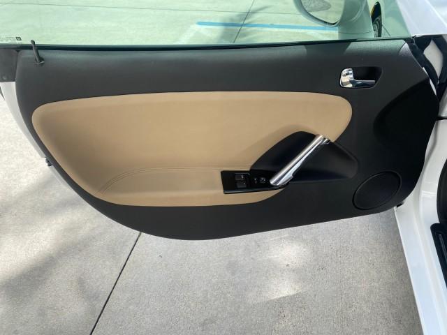 2007 Polar White /Tan Saturn Sky LOW MILES 21,329 5 SPEED MANUAL (1G8MB35B47Y) with an 2.4L DOHC VVT I4 Aluminum Ecotec Engine engine, Manual transmission, located at 4701 North Dixie Hwy, Pompano Beach, FL, 33064, (954) 422-2889, 26.240938, -80.123474 - OUR WEBPAGE FLORIDACARS1.COM HAS OVER 100 PHOTOS AND FREE CARFAX LINK 2007 Saturn SKY 5 SPEED MANUAL Convertible 2.4L I4 F DOHC Gasoline 28 MPG Rear Wheel Drive Features ABS Brakes Air Conditioning Alloy Wheels AM/FM Stereo Auxiliary Audio Input CD Audio Cruise Control Leather Seats Manual Transmiss - Photo#58