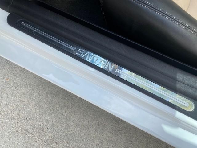 2007 Polar White /Tan Saturn Sky LOW MILES 21,329 5 SPEED MANUAL (1G8MB35B47Y) with an 2.4L DOHC VVT I4 Aluminum Ecotec Engine engine, Manual transmission, located at 4701 North Dixie Hwy, Pompano Beach, FL, 33064, (954) 422-2889, 26.240938, -80.123474 - OUR WEBPAGE FLORIDACARS1.COM HAS OVER 100 PHOTOS AND FREE CARFAX LINK 2007 Saturn SKY 5 SPEED MANUAL Convertible 2.4L I4 F DOHC Gasoline 28 MPG Rear Wheel Drive Features ABS Brakes Air Conditioning Alloy Wheels AM/FM Stereo Auxiliary Audio Input CD Audio Cruise Control Leather Seats Manual Transmiss - Photo#59