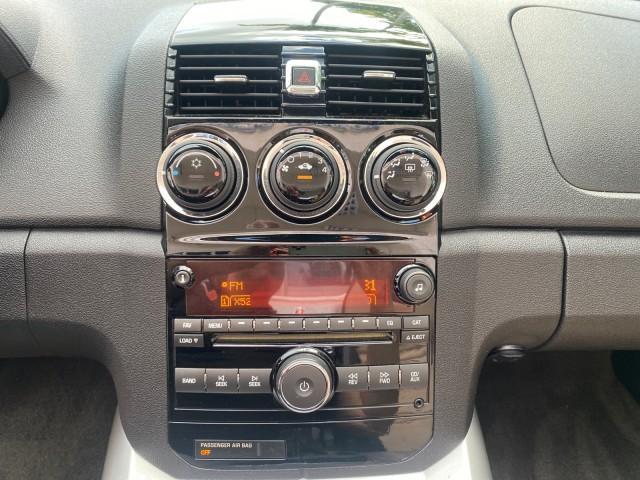 2007 Polar White /Tan Saturn Sky LOW MILES 21,329 5 SPEED MANUAL (1G8MB35B47Y) with an 2.4L DOHC VVT I4 Aluminum Ecotec Engine engine, Manual transmission, located at 4701 North Dixie Hwy, Pompano Beach, FL, 33064, (954) 422-2889, 26.240938, -80.123474 - OUR WEBPAGE FLORIDACARS1.COM HAS OVER 100 PHOTOS AND FREE CARFAX LINK 2007 Saturn SKY 5 SPEED MANUAL Convertible 2.4L I4 F DOHC Gasoline 28 MPG Rear Wheel Drive Features ABS Brakes Air Conditioning Alloy Wheels AM/FM Stereo Auxiliary Audio Input CD Audio Cruise Control Leather Seats Manual Transmiss - Photo#74