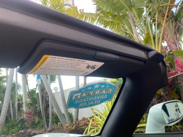 2007 Polar White /Tan Saturn Sky LOW MILES 21,329 5 SPEED MANUAL (1G8MB35B47Y) with an 2.4L DOHC VVT I4 Aluminum Ecotec Engine engine, Manual transmission, located at 4701 North Dixie Hwy, Pompano Beach, FL, 33064, (954) 422-2889, 26.240938, -80.123474 - OUR WEBPAGE FLORIDACARS1.COM HAS OVER 100 PHOTOS AND FREE CARFAX LINK 2007 Saturn SKY 5 SPEED MANUAL Convertible 2.4L I4 F DOHC Gasoline 28 MPG Rear Wheel Drive Features ABS Brakes Air Conditioning Alloy Wheels AM/FM Stereo Auxiliary Audio Input CD Audio Cruise Control Leather Seats Manual Transmiss - Photo#81