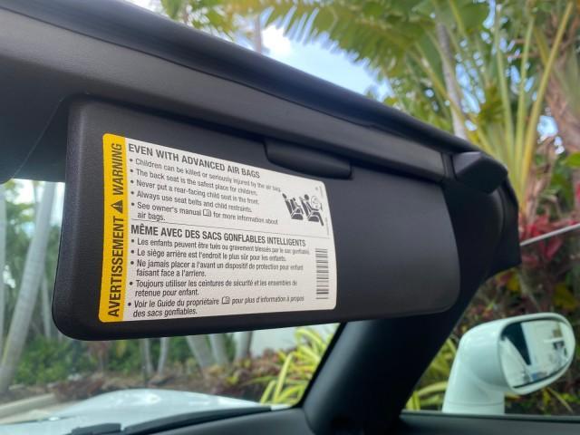 2007 Polar White /Tan Saturn Sky LOW MILES 21,329 5 SPEED MANUAL (1G8MB35B47Y) with an 2.4L DOHC VVT I4 Aluminum Ecotec Engine engine, Manual transmission, located at 4701 North Dixie Hwy, Pompano Beach, FL, 33064, (954) 422-2889, 26.240938, -80.123474 - OUR WEBPAGE FLORIDACARS1.COM HAS OVER 100 PHOTOS AND FREE CARFAX LINK 2007 Saturn SKY 5 SPEED MANUAL Convertible 2.4L I4 F DOHC Gasoline 28 MPG Rear Wheel Drive Features ABS Brakes Air Conditioning Alloy Wheels AM/FM Stereo Auxiliary Audio Input CD Audio Cruise Control Leather Seats Manual Transmiss - Photo#82