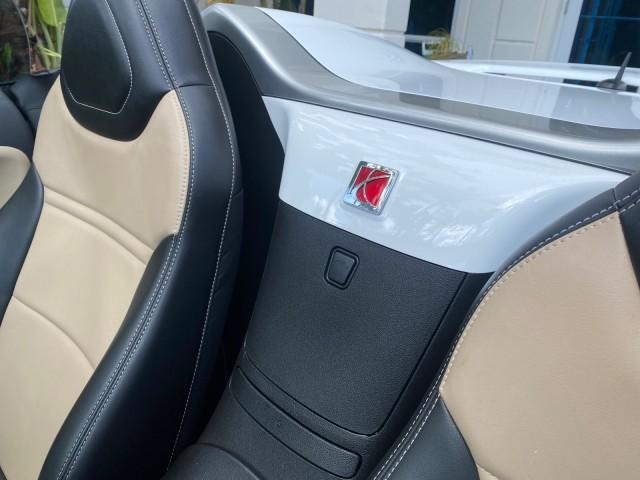 2007 Polar White /Tan Saturn Sky LOW MILES 21,329 5 SPEED MANUAL (1G8MB35B47Y) with an 2.4L DOHC VVT I4 Aluminum Ecotec Engine engine, Manual transmission, located at 4701 North Dixie Hwy, Pompano Beach, FL, 33064, (954) 422-2889, 26.240938, -80.123474 - OUR WEBPAGE FLORIDACARS1.COM HAS OVER 100 PHOTOS AND FREE CARFAX LINK 2007 Saturn SKY 5 SPEED MANUAL Convertible 2.4L I4 F DOHC Gasoline 28 MPG Rear Wheel Drive Features ABS Brakes Air Conditioning Alloy Wheels AM/FM Stereo Auxiliary Audio Input CD Audio Cruise Control Leather Seats Manual Transmiss - Photo#83