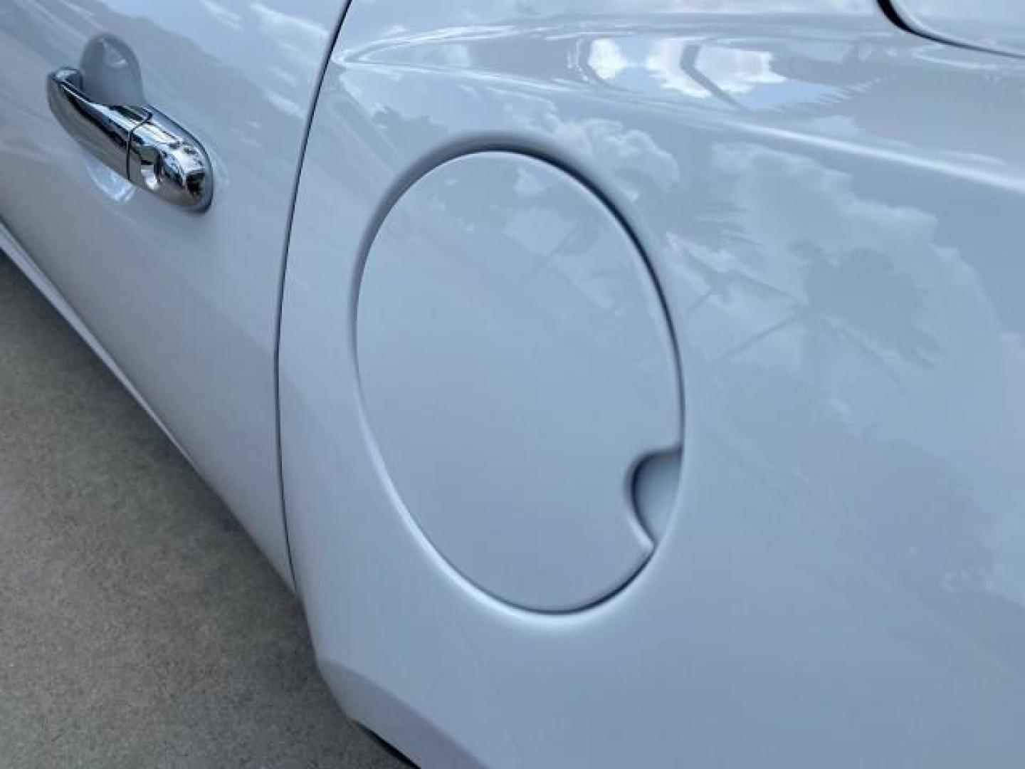 2007 Polar White /Tan Saturn Sky LOW MILES 21,329 5 SPEED MANUAL (1G8MB35B47Y) with an 2.4L DOHC VVT I4 Aluminum Ecotec Engine engine, Manual transmission, located at 4701 North Dixie Hwy, Pompano Beach, FL, 33064, (954) 422-2889, 26.240938, -80.123474 - OUR WEBPAGE FLORIDACARS1.COM HAS OVER 100 PHOTOS AND FREE CARFAX LINK 2007 Saturn SKY 5 SPEED MANUAL Convertible 2.4L I4 F DOHC Gasoline 28 MPG Rear Wheel Drive Features ABS Brakes Air Conditioning Alloy Wheels AM/FM Stereo Auxiliary Audio Input CD Audio Cruise Control Leather Seats Manual Transmiss - Photo#85