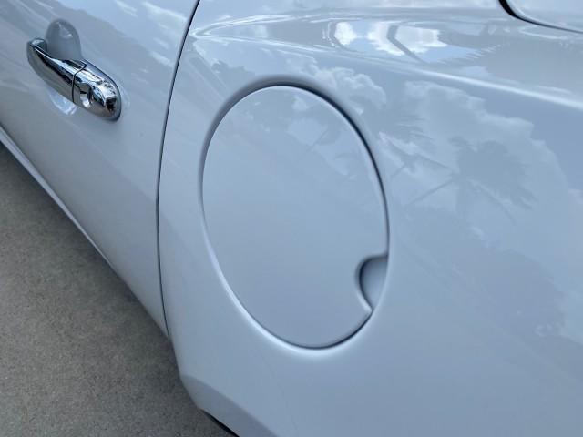 2007 Polar White /Tan Saturn Sky LOW MILES 21,329 5 SPEED MANUAL (1G8MB35B47Y) with an 2.4L DOHC VVT I4 Aluminum Ecotec Engine engine, Manual transmission, located at 4701 North Dixie Hwy, Pompano Beach, FL, 33064, (954) 422-2889, 26.240938, -80.123474 - OUR WEBPAGE FLORIDACARS1.COM HAS OVER 100 PHOTOS AND FREE CARFAX LINK 2007 Saturn SKY 5 SPEED MANUAL Convertible 2.4L I4 F DOHC Gasoline 28 MPG Rear Wheel Drive Features ABS Brakes Air Conditioning Alloy Wheels AM/FM Stereo Auxiliary Audio Input CD Audio Cruise Control Leather Seats Manual Transmiss - Photo#85